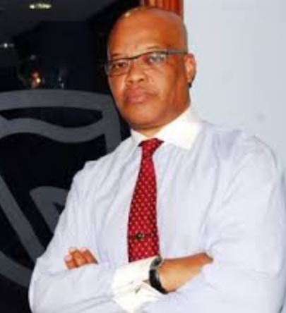 John Ngumi Biography, Wiki, Wife, Net Worth, Children, Parents, Age, Career & More 2 An old photo of John Ngumi