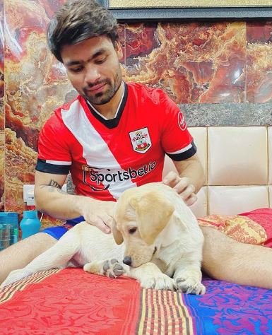 Rinku with his pet dog