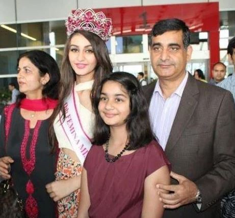 Aditi with her parents and sister'