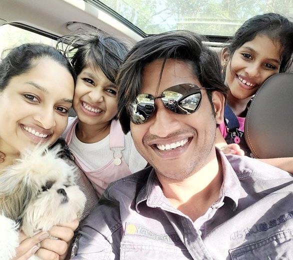 Akhil Marar Wiki, Biography, Wife, Children, Age, Net Worth, Parents, Movies & More 6 Akhil with his family