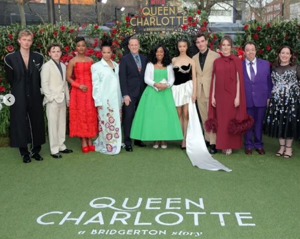 Corey Mylchreest: Wiki, Age, Birthday, Height, Parents, Girlfriend, Net worth, Biography & More 7 Corey with the cast of Queen Charlotte