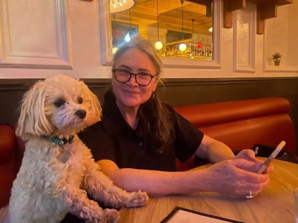 Pam Van Sant Wiki (Treat Williams' Wife), Age, Family, Kids, Net Worth, Biography & More 10 Pam with her pet dog