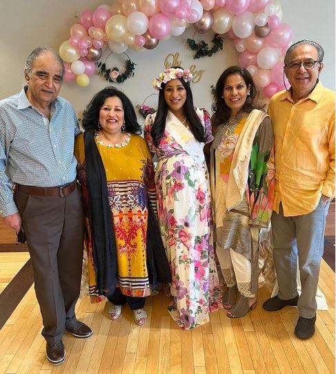 Sabrina with her parents