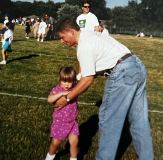 Childhood photo of Catherine with her dad