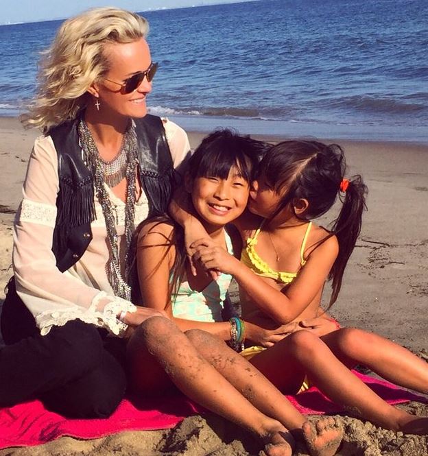 Laeticia Hallyday (Johnny Hallyday's Wife) Wiki, Age, Boyfriend, Net worth, Kids, Family & More 4 Laeticia with her daughters