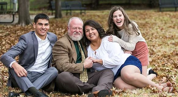 Shawn Warner with his wife and kids