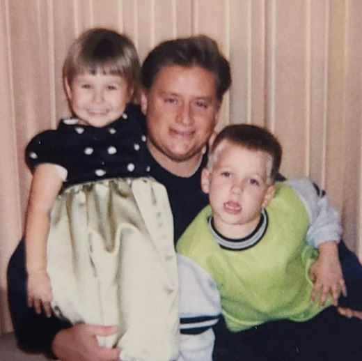 Young Catherine with her dad and brother