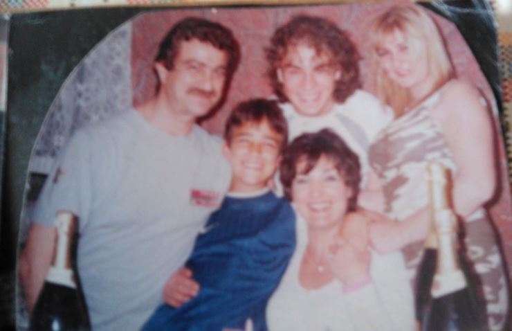 Childhood photo of Mario with his parents and siblings