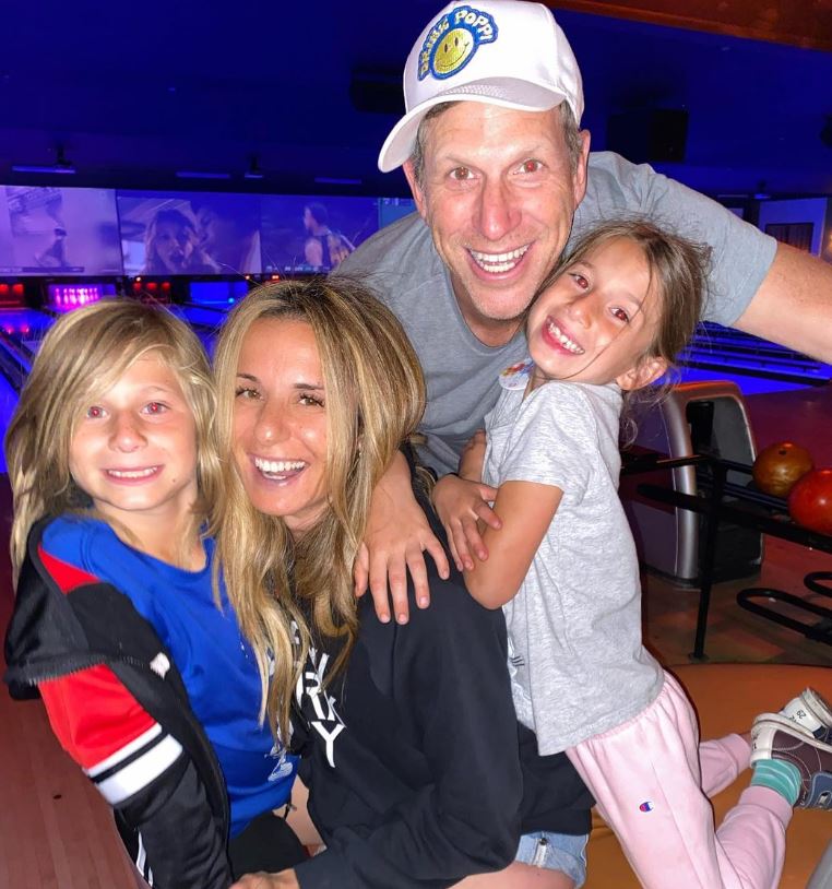 Jennifer with her husband and kids