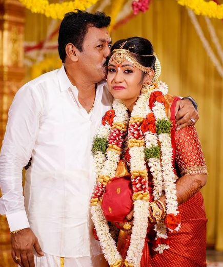 Sruthi Shanmuga with her father