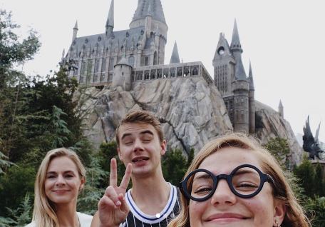 Maddy with her siblings