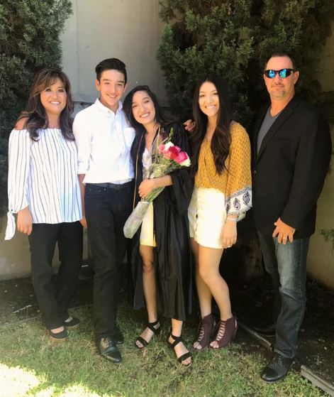 Paige Gallagher with her parents and siblings