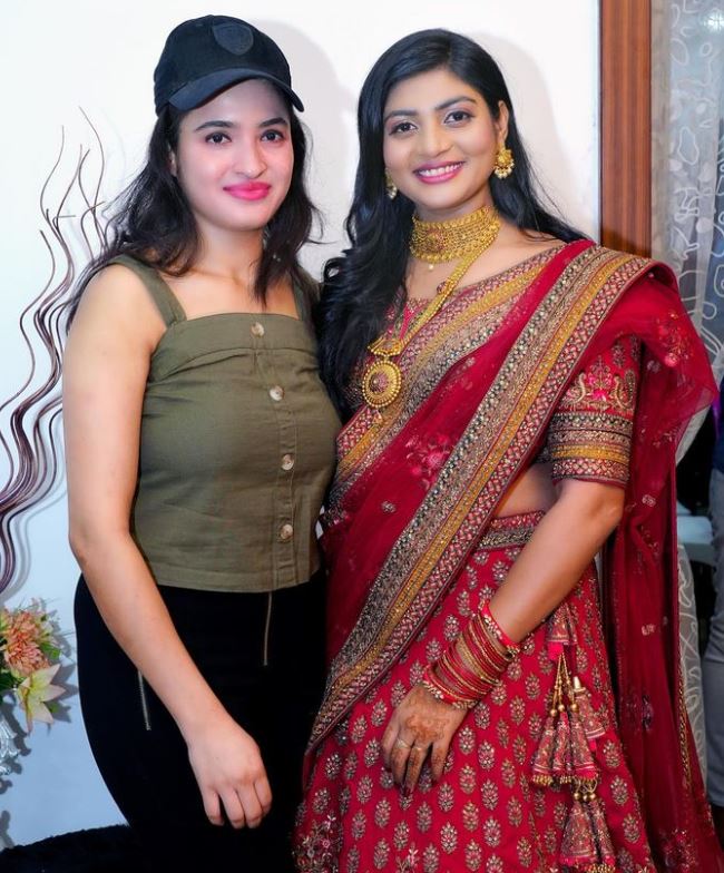 Rathika and her friend