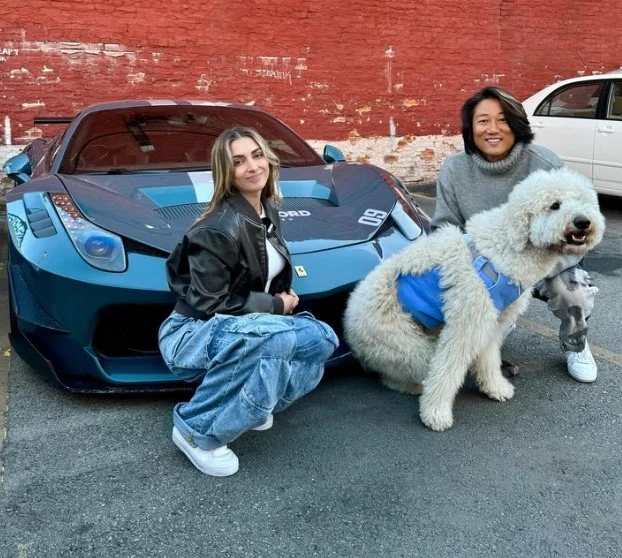 Sung Kang with model Emelia Hartford